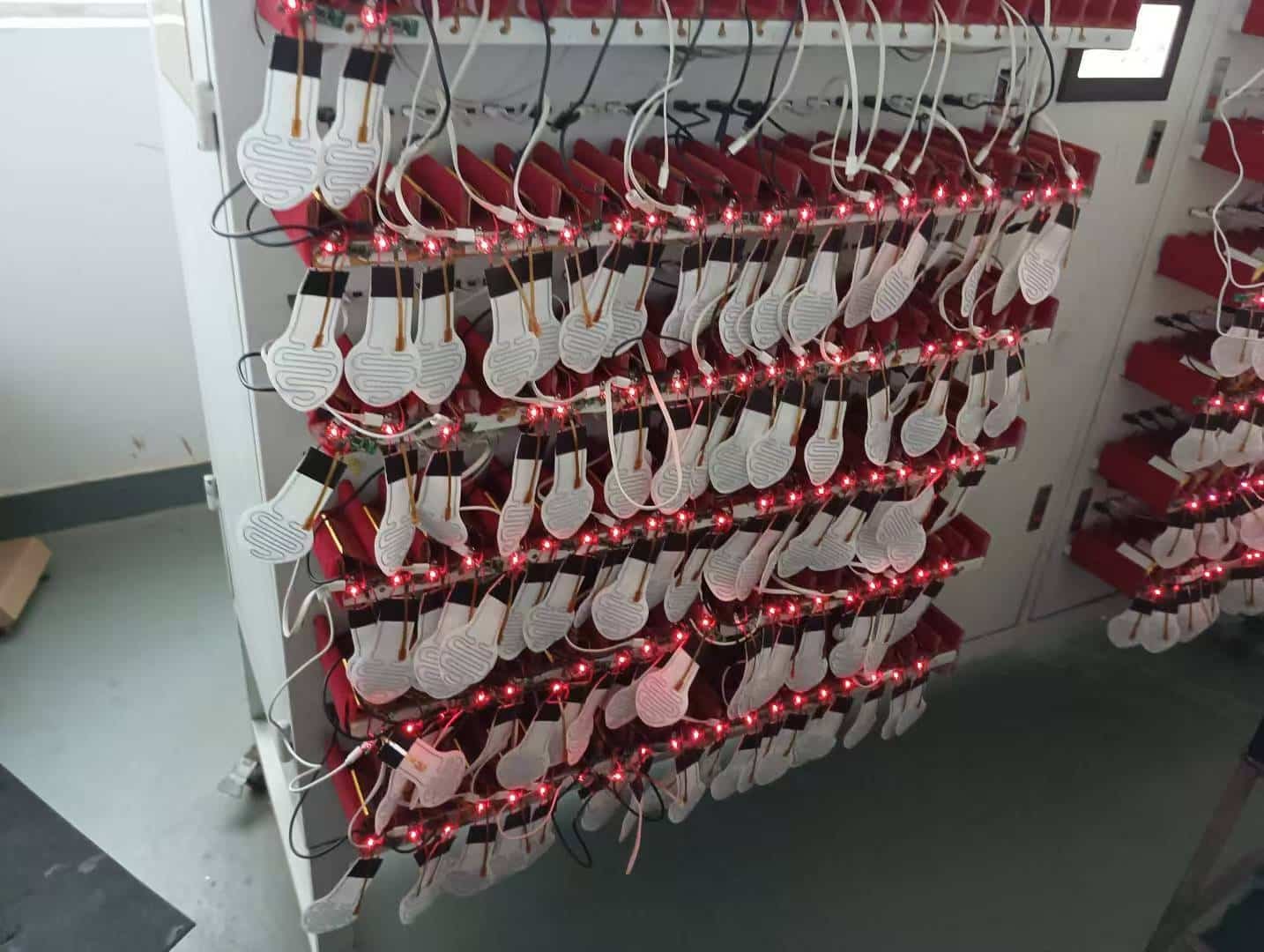 Close-up of a simple three-level switch for heated gear, showing low, medium, and high settings for glove-friendly manual control.