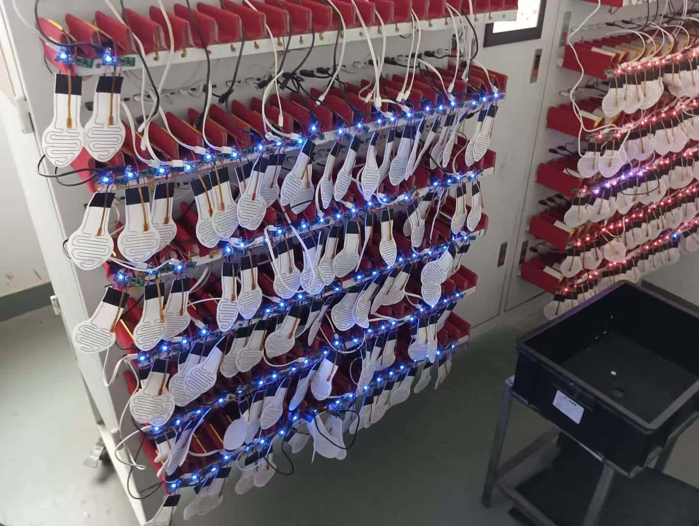 Close-up action shot or diagram showing a carbon fiber heating panel being flexed, bent, or stretched without damage, illustrating its resilience.