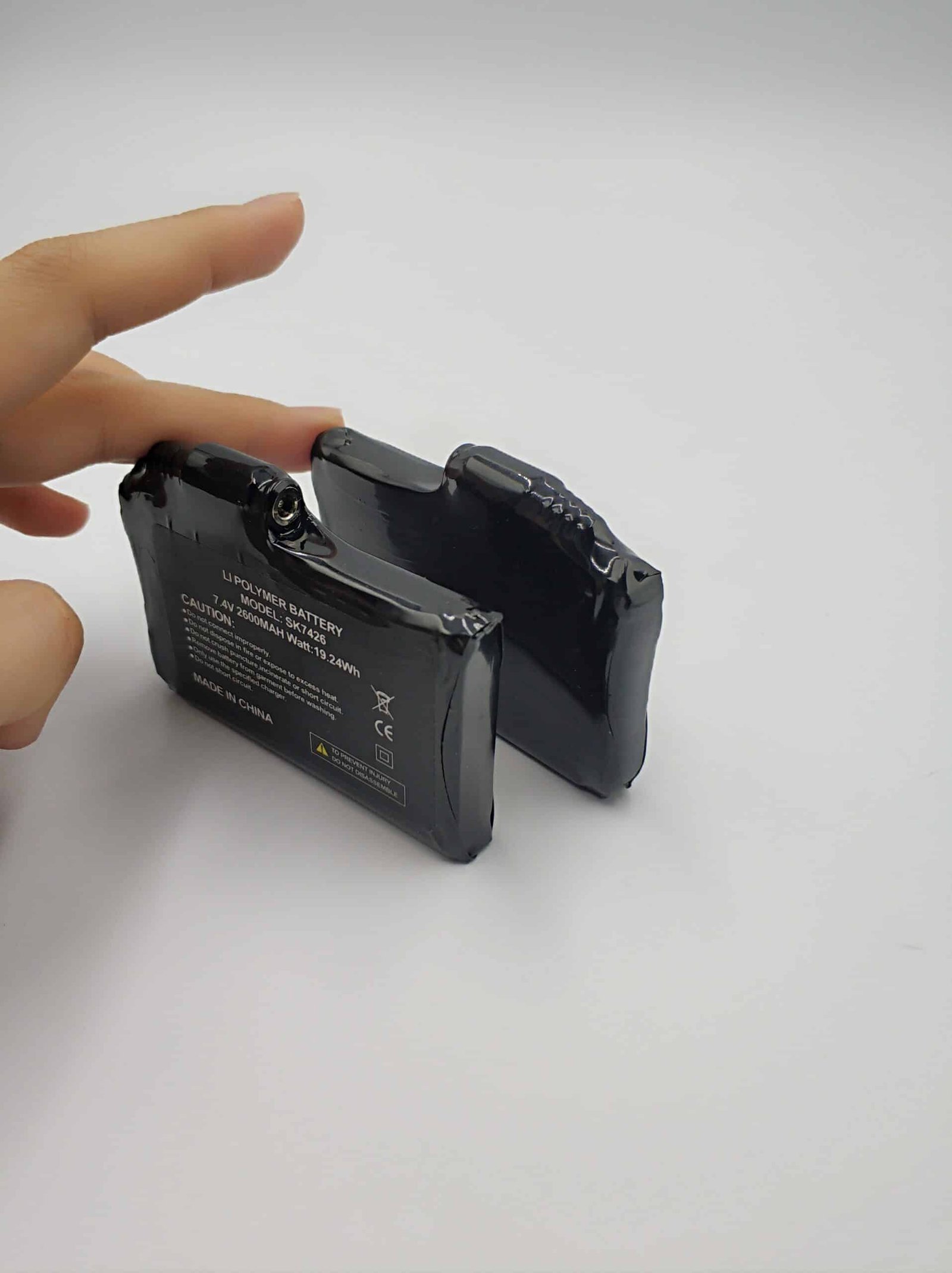 Visual guide with tips for maintaining heated apparel batteries: store at 50-80% charge, keep at room temperature, use OEM charger.