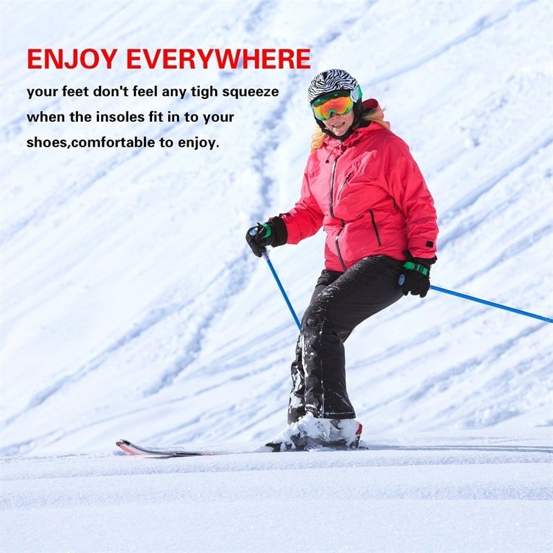 Outdoor enthusiast wearing boots with wired heated insoles while standing in snow, ideal for hunting or skiing.