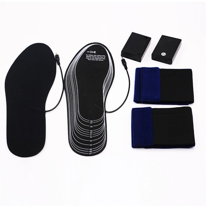 A pair of thin, flexible heated insoles or shoe pads with integrated carbon fiber heating elements and a wire leading to a battery connector.
