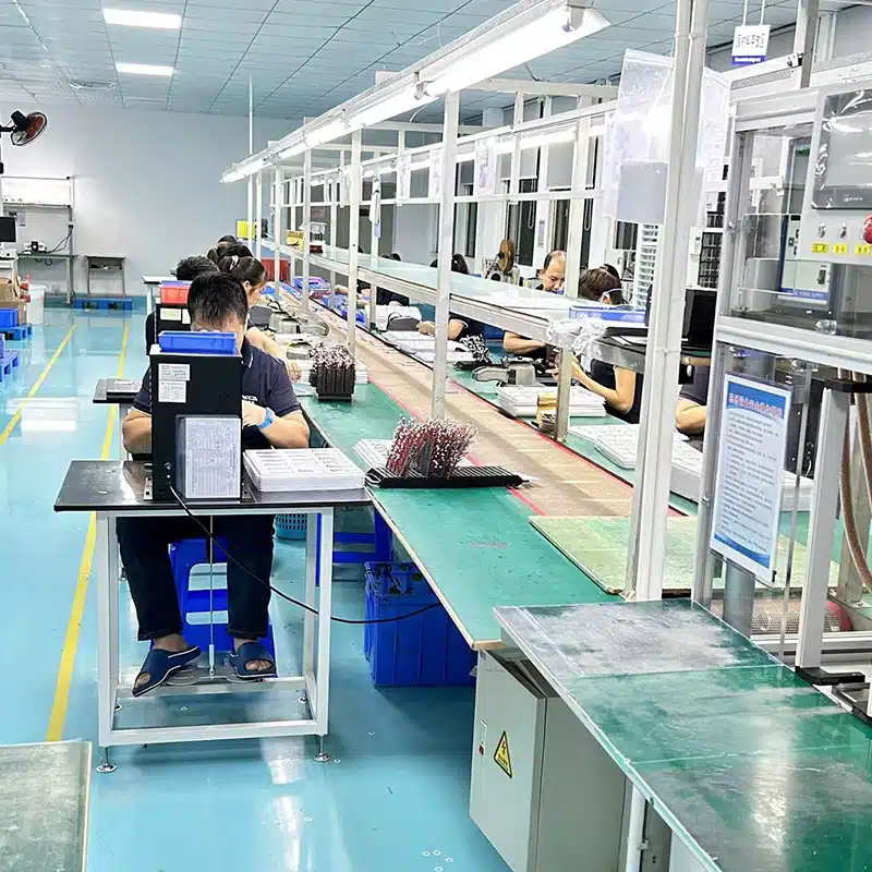 factory production line assembling waterproof and sweat resistant PCBA electronics for heated gloves and heated insoles in heated wearables manufacturing