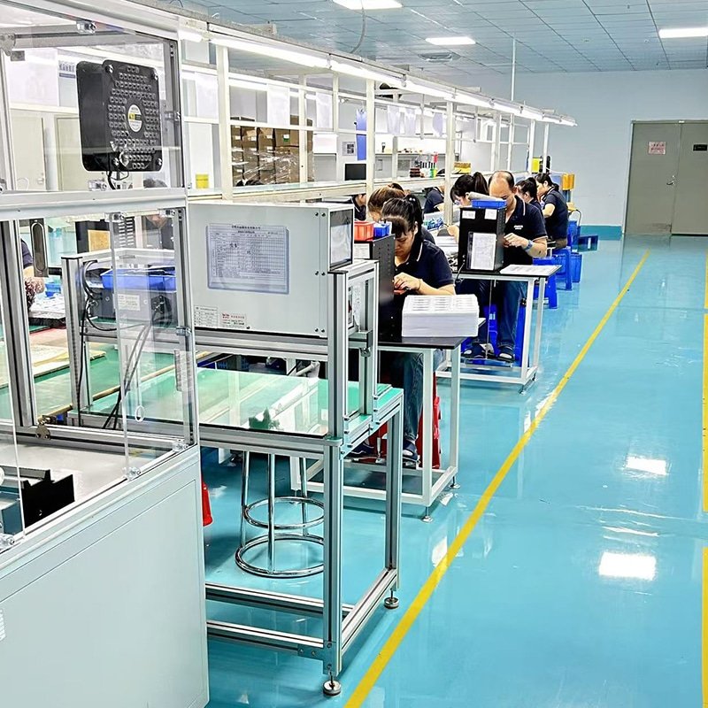 factory PCBA assembly line producing heated apparel electronics and PCB layout systems for battery powered heated clothing