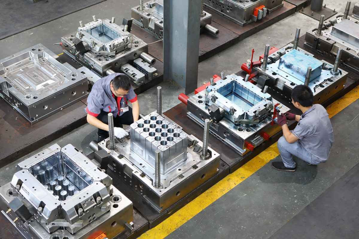 In-house mold workshop with precision tooling equipment