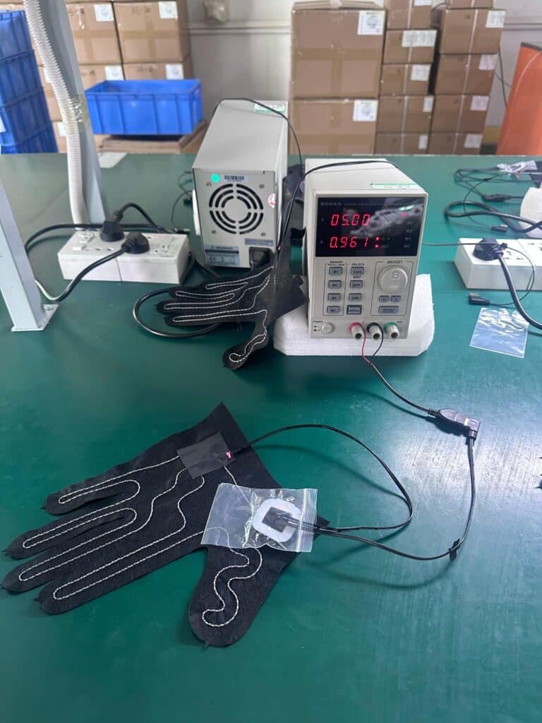 Testing the heating performance of heated glove elements with a digital power supply